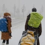 Weltreisende im Schneesturm