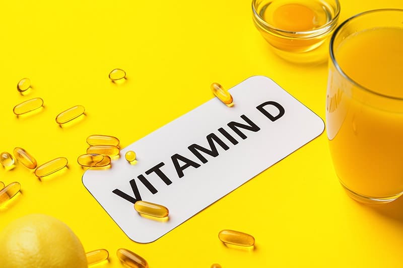 Vitamin-D mit gelben Kapseln